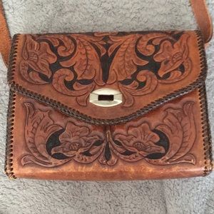 Carved vintage brown handbag